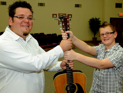 Pastor Earl from the A/G worship team with his son