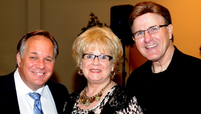 Pastor Percy Kallevig with Larry and Gloria