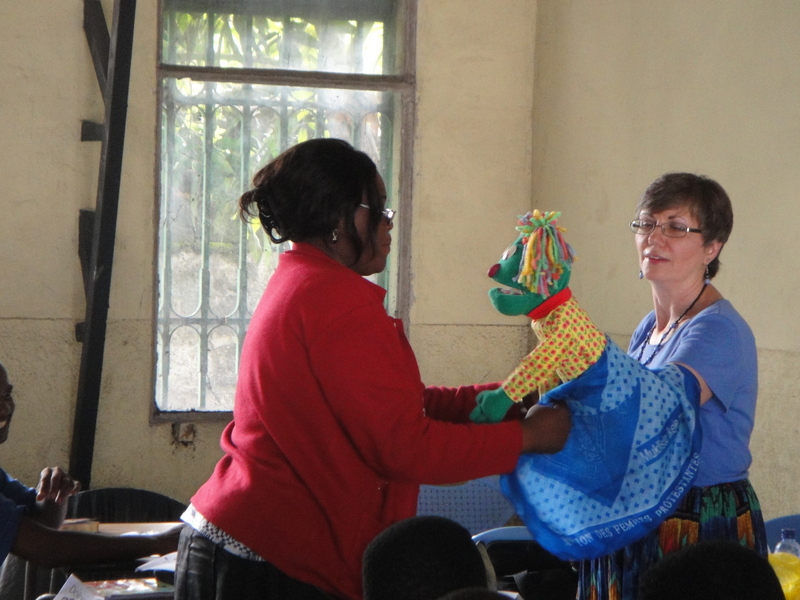 Sonia with her puppet friend Rainbow...