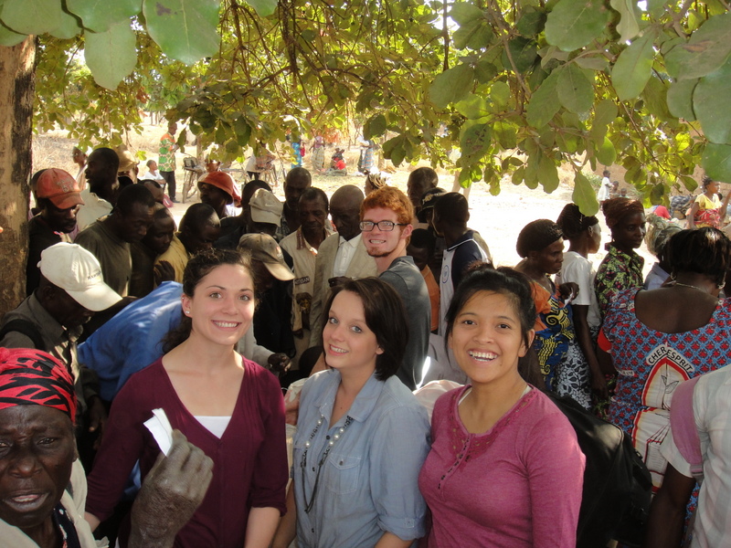 Engage students Hannah, Savannah, Michelle and Zach in the village.