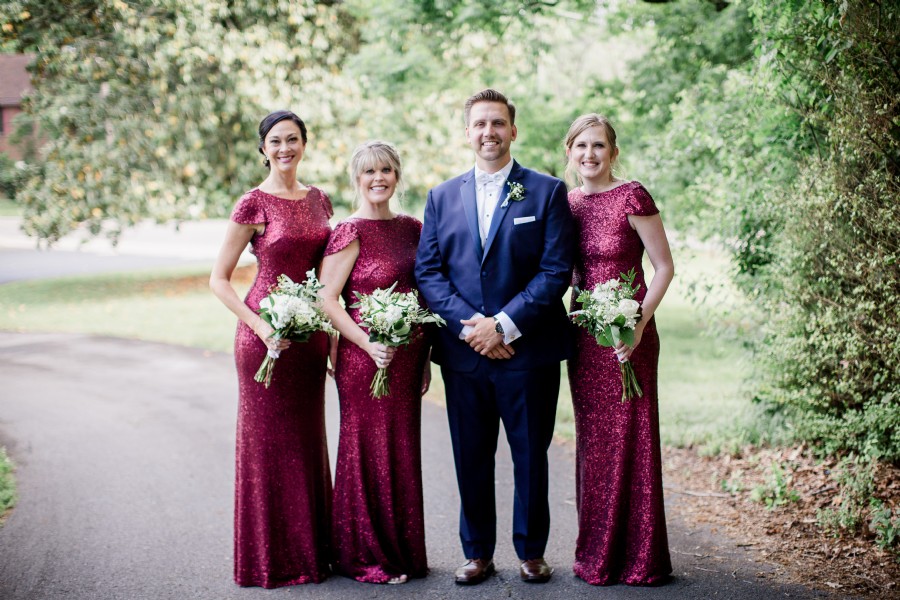 Photo of the groom and bridesmaids on the church grounds at Graystone Presbyterian Church in Knoxville Tennessee