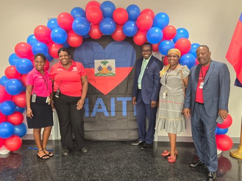 Posing with the school personnel 