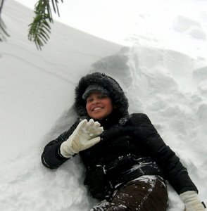 Myanna getting cozy on a snowdrift