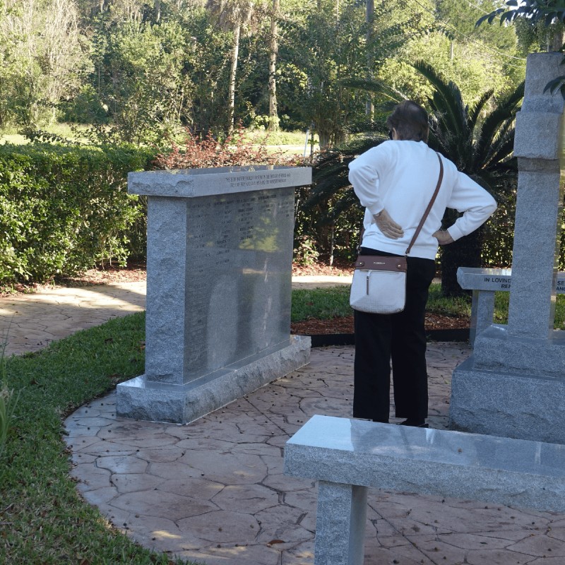 THE MEMORIAL GARDEN features a winding path with benches, making it a beautiful place to rest and reflect.